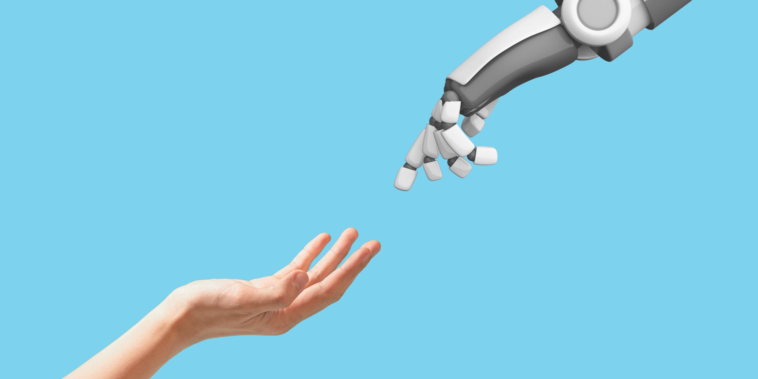 human hand and robot hand with empty space on blue utc