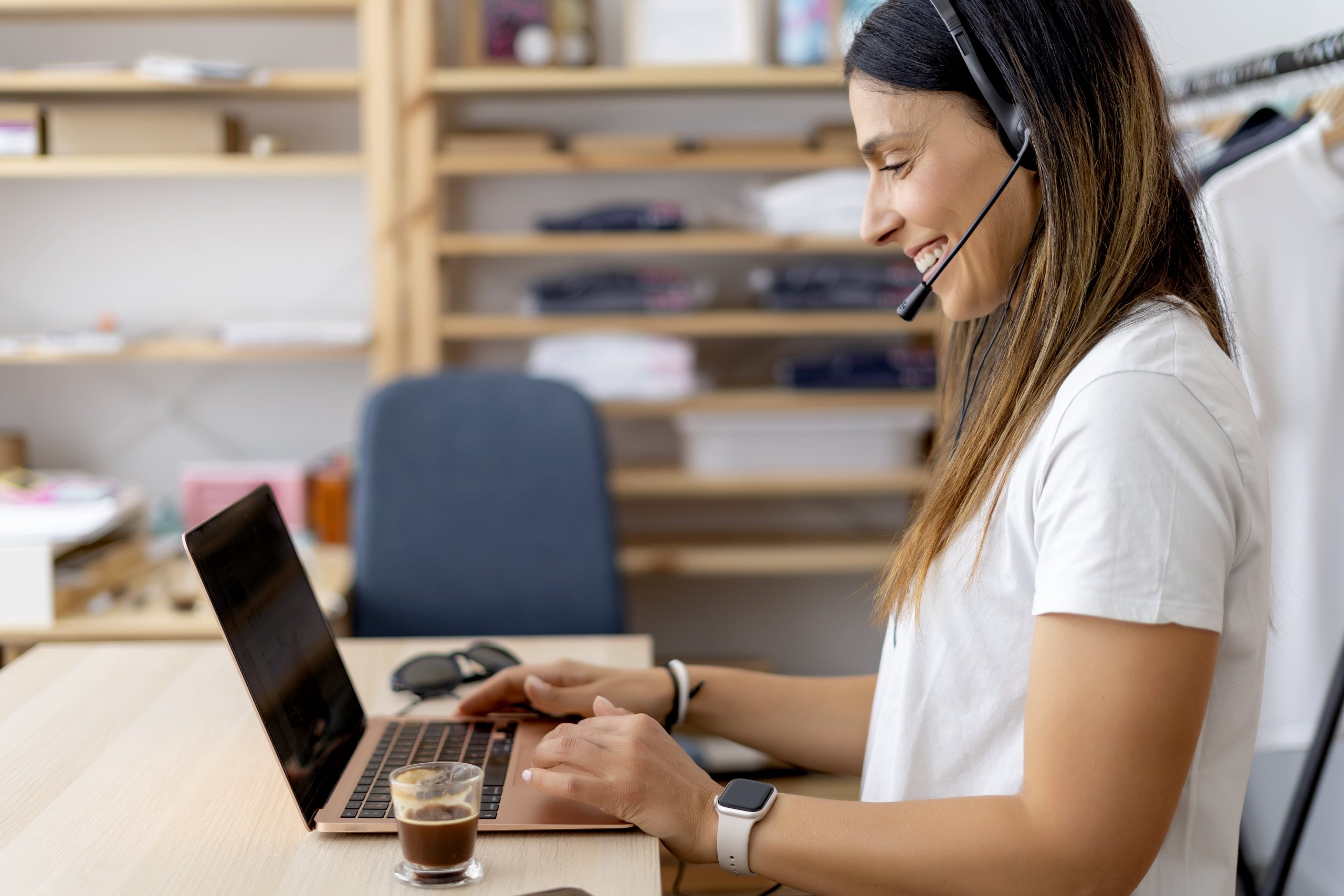 woman teleworking at home with computer utc min